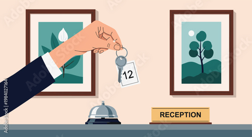 Hand holding a set of hotel room keys with a number tag over a reception desk featuring a service bell and pictures.