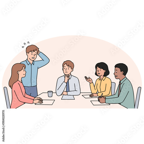 People sitting around a table discussing and looking stressed at work