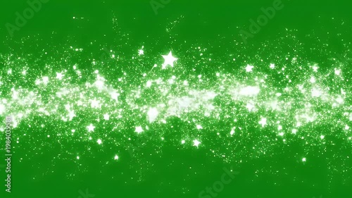 White sparkling stars with glitter trail on green screen