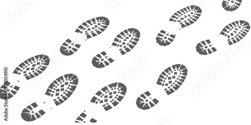 A sequence of dark grey boot prints arranged in pairs across a clean and stark white background.