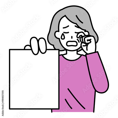 書類を見せて泣く年配の女性