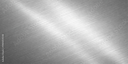 A polished stainless steel plate featuring a smooth brushed metal texture with shiny silver reflections on a gray industrial aluminum surface backdrop