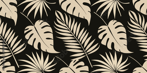 Seamless pattern of tropical monstera and palm leaves on black background