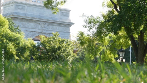 New York City Manhattan Washington Square Park arch, United States. Marble historic monument Greenwich Village. 5 fifth avenue triumphal arch. Autumn fall garden greenery. George Washington memorial.