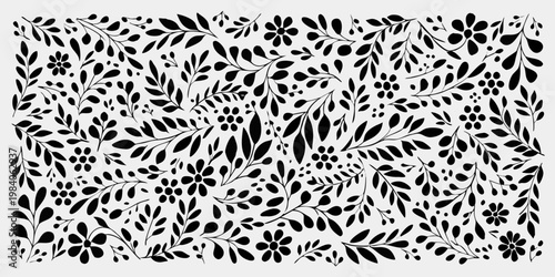 Intricate black floral pattern covering a white background