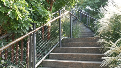 New York City Little Island pier park in Midtown of Manhattan, United States. Urban garden oasis on pillars in Chelsea, USA. Biophilic futuristic contemporary design, eco flora, plants and greenery.