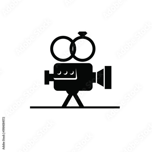 Wedding Videography Icon with Vintage Film Camera and Engagement Rings