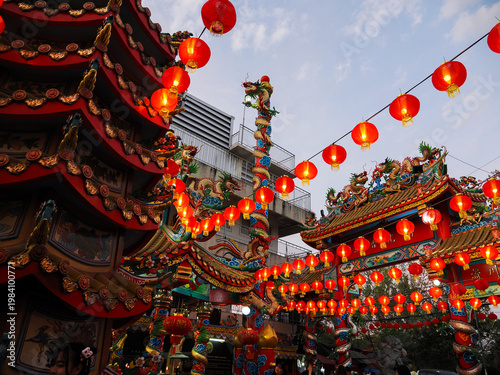 Traditional Chinese dragon installation in Chinese temple with Lunar new year attributes and decoration