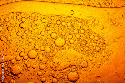 Golden Oil Bubbles and Liquid Macro Texture,Macro,Abstract macro shot of golden liquid bubbles of various sizes, creating a beautiful organic pattern. This texture represents oil in water, fuel,
