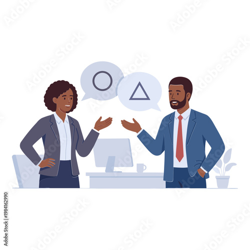 Two office workers discuss shapes at a desk in an office setting.