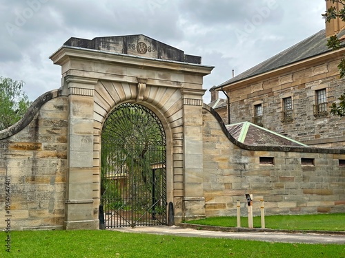 Sandstone archway and iron gate at Callan Park in Sydney, highlighting historic architecture and heritage design