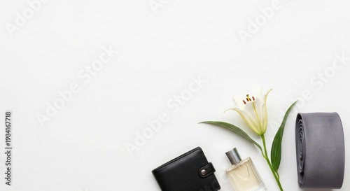 Minimalist still life with flowers wallet perfume and belt on white background