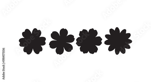 Natural floral silhouettes collection featuring four unique black flower shapes in horizontal sequence for design element.