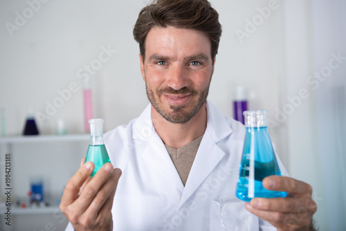 young male researcher carrying out scientific research