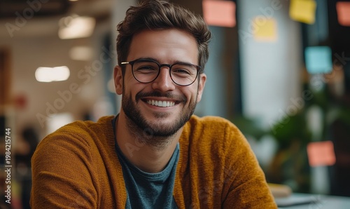Smiling Man Wearing Glasses and a Sweater