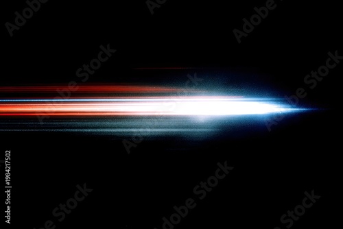 A striking long exposure photograph captures the dynamic streaks of light from passing vehicles at night.