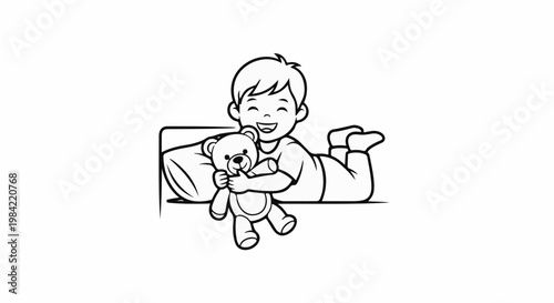 Happy child lying on a pillow, hugging a teddy bear