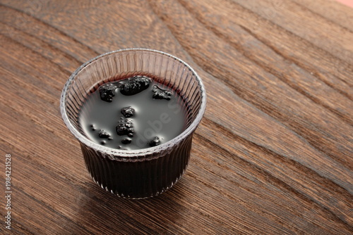 The glass cup contains mulberry tea