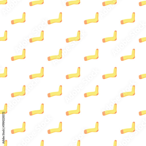 Yellow socks creating a repetitive seamless pattern on a white background, useful for textile and apparel
