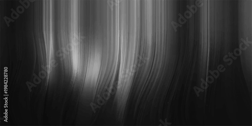 abstract streaks of light in monochromatic composition, creating an effect of a flowing or a rippling motion. Perfect background.