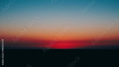 Serene sunset with gradient colors over the horizon at twilight  
