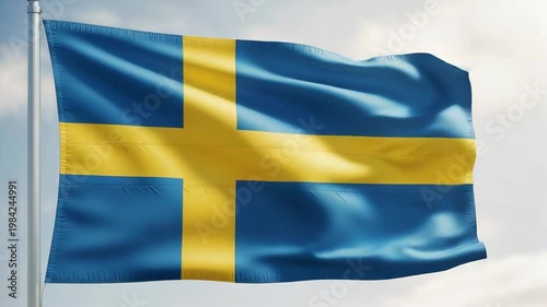 Swedish flag waving in the wind against a clear sky  