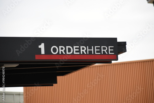 A sign that says 1 Order Here. Clear sign and instruction. Guide for buyers. Crowd Management.