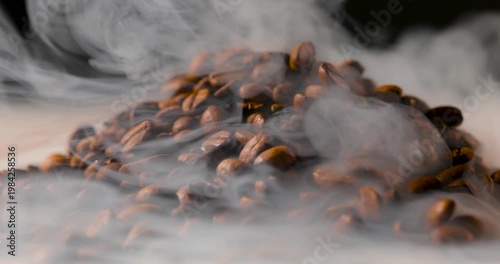 Extreme close-up of roasted coffee beans with visible steam rising, highlighting rich texture and warmth in soft, cinematic lighting. Shallow depth of field with smooth background blur