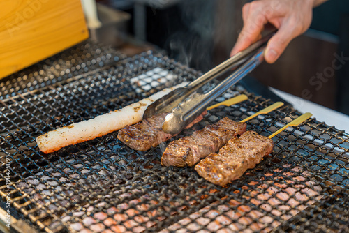 Grilled meat, street food, Osaka, Japan.