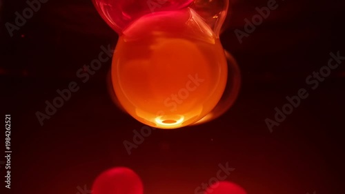 Floating colorful balloons in dark ambient light