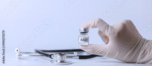 Konstfotografi Doctor hand in medical glove holds nad+ vial expressing hopeful longevity treatm