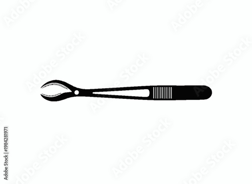 Dental Tool Precision: A high-angle, isolated shot features a detailed pair of forceps, essential in the dental field. Highlighting precision and professional care.