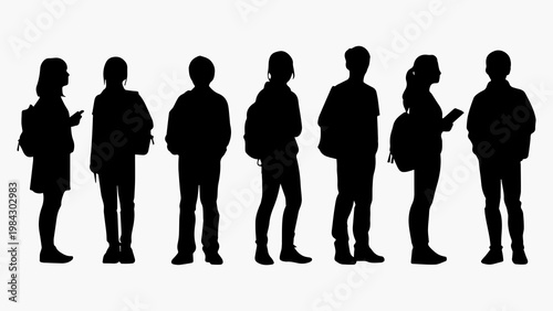 Silhouette of a group of school children standing in a row with their backpacks on