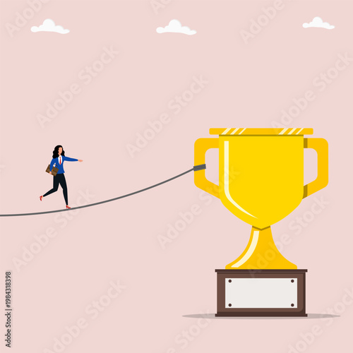 Businesswoman walking on tightrope connected to golden trophy, symbolizing risk and reward in achieving success.