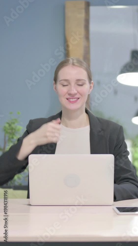 Wallpaper Mural Thumbs Up by Businesswoman Working on Laptop, Vertical Video Torontodigital.ca