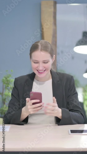 Wallpaper Mural Successful Businesswoman Celebrating Win on Smartphone, Vertical Video Torontodigital.ca