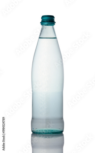 Glass Mineral Water Bottle Without Label Isolated on White Background
