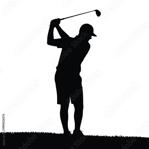 A golfer in silhouette swings a club on a grassy field