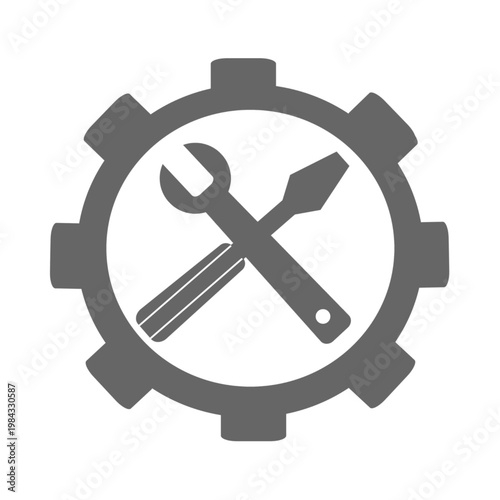 Gray gear icon with crossed wrench and screwdriver tools on white background for repair and maintenance concepts