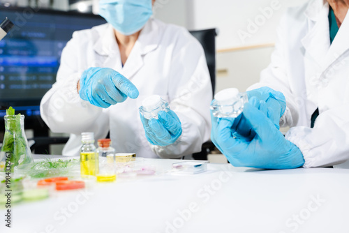 Cosmetic lab testing skincare products with natural ingredients, advanced science, and clean beauty innovation