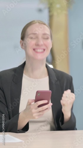 Wallpaper Mural Successful Businesswoman Celebrating Win on Smartphone, Vertical Video Torontodigital.ca