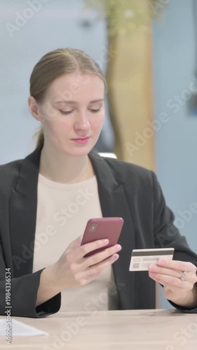 Wallpaper Mural Businesswoman making Successful Online Payment on Smartphone, Vertical Video Torontodigital.ca