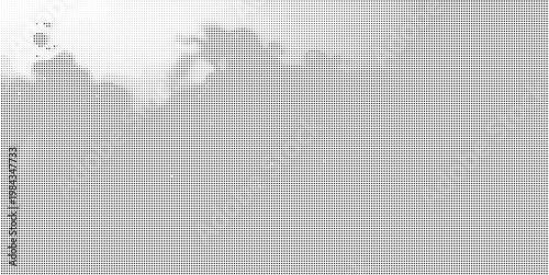 Dense halftone dot pattern transitioning to sparse dots, abstract design.