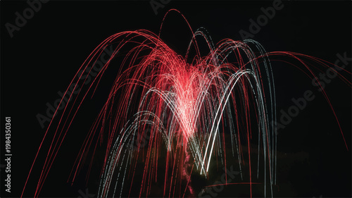 A vibrant display of colorful streaks forms a heart shape in a dark environment.