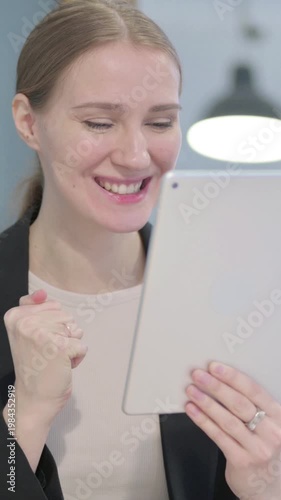 Wallpaper Mural Businesswoman Cheering Success on Digital Tablet, Vertical Video Torontodigital.ca