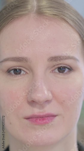 Wallpaper Mural Close Up of Serious Businesswoman Face, Vertical Video Torontodigital.ca