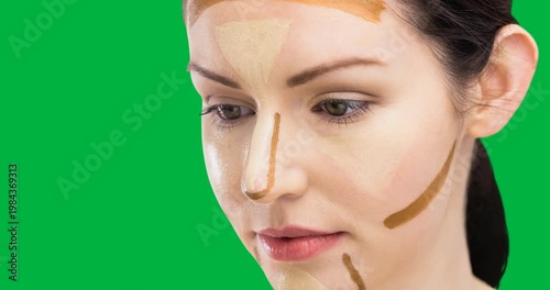 Caucasian woman with contour face makeup against black background