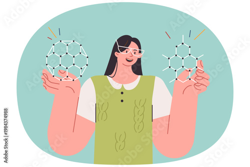 Woman student holds molecular models of chemical elements while studying science at university