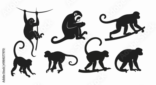 Silhouettes of seven monkeys in various poses on a white background