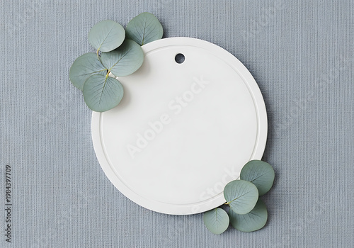 Wallpaper Mural A white circle with green leaves on a gray background Torontodigital.ca